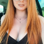 Beautiful redhead from Winnipeg, with gorgeous cleavage