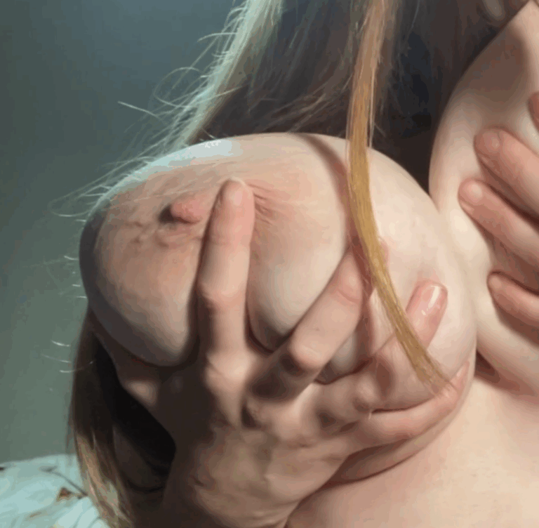 Quebecer plays with her very large boob