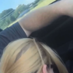 blonde sucking off a guy while driving