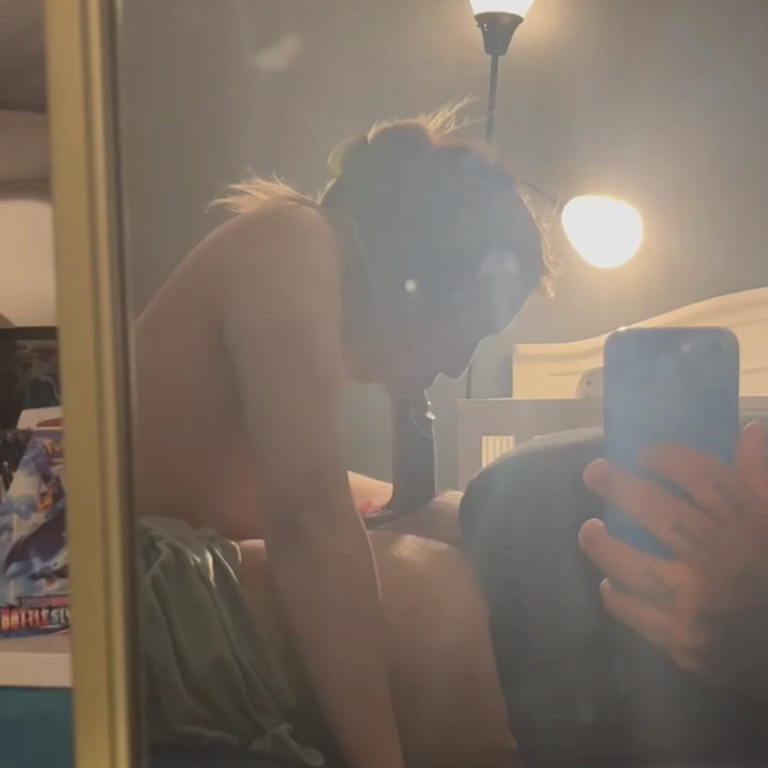 couple videotaping a blowjob sextape thru the mirror